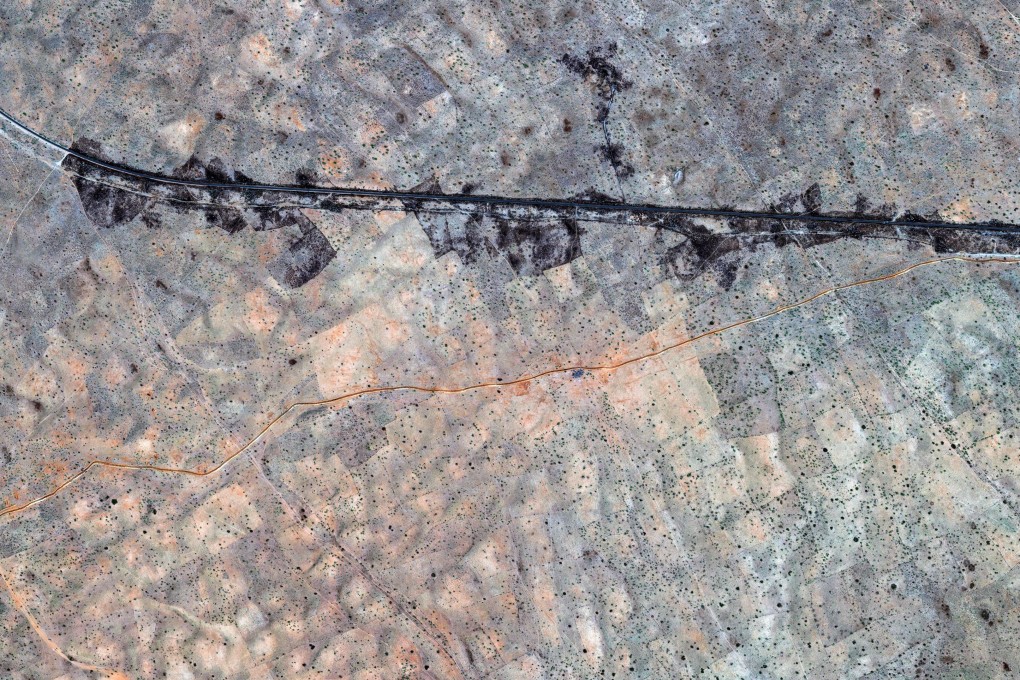 This satellite image taken on October 30, 2025 and made available on October 31, 2025 shows a burned area along the berm northwest of El-Fasher. Photo: Vantor via AFP