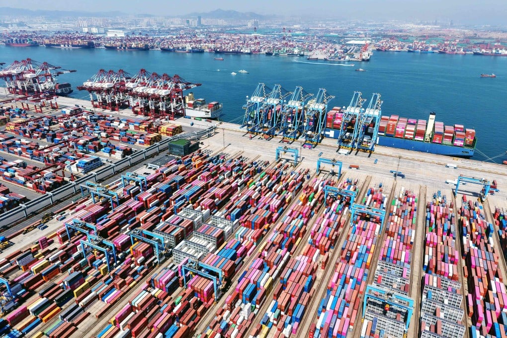Shipping containers and transport vessels are seen at a port in China’s Shandong province earlier this year. Photo: AFP