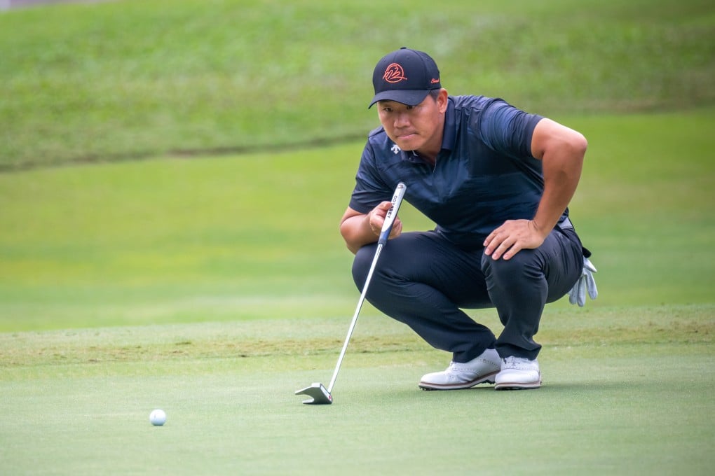 Wu Ashun focuses on a putt during round two at Hong Kong Golf Club on Friday. Photo: Asian Tour