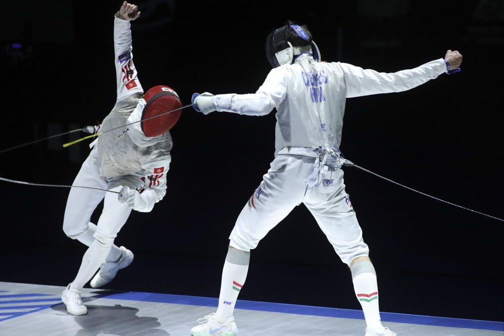 Hong Kong’s Ryan Choi (left) on his way to winning the foil world title in Tbilisi in July. Photo: EPA