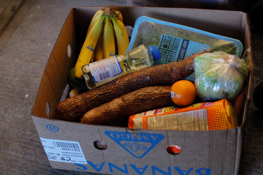 Food sits in a box of free groceries for residents at a food pantry run in Massachusetts. Photo: Reuters