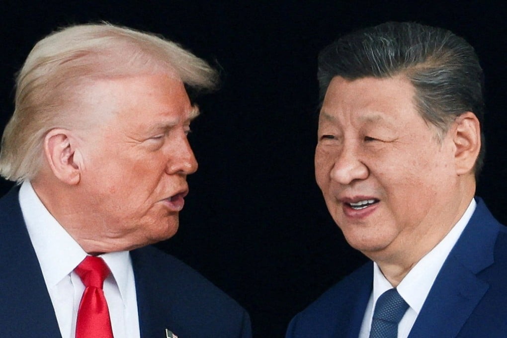 US President Donald Trump and Chinese President Xi Jinping talk as they leave after a bilateral meeting in Busan, South Korea on Thursday. Photo: Reuters