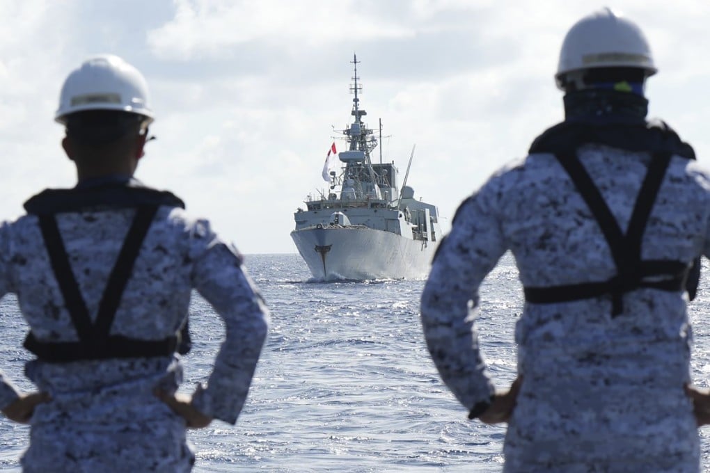 Philippine Navy personnel watch a Canadian vessel during the joint exercises in the South China Sea last year. Photo: Public Affairs Office Armed Forces of the Philippines/AP