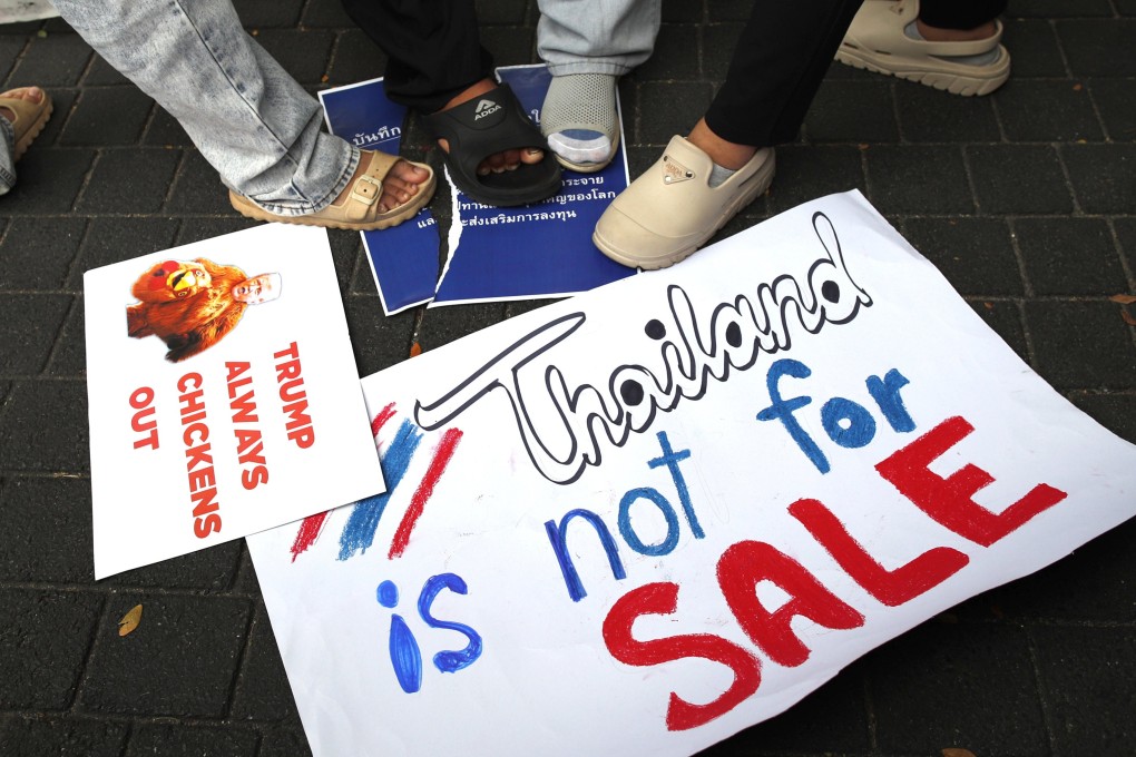 Thai demonstrators step on a mock memorandum of understanding during a protest outside the US embassy in Bangkok on Thursday against a Thai-US agreement on rare earth cooperation. Photo: EPA