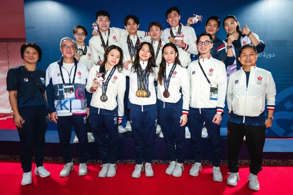 Members of the Hong Kong swimming team celebrate their success at the Asian Youth Games. Photo: SF&OC