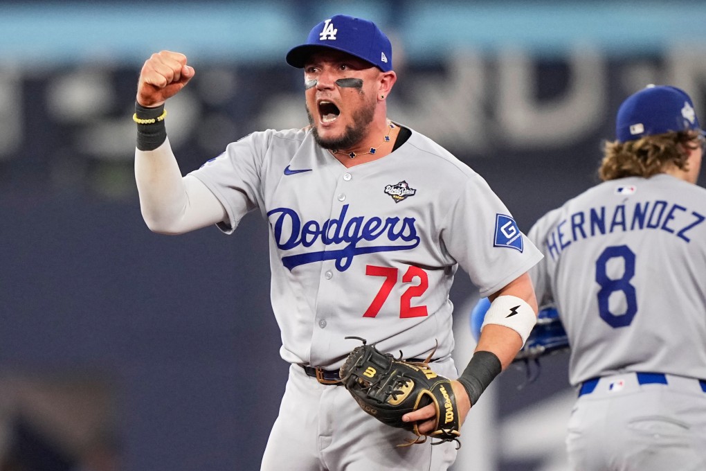 Los Angeles Dodgers second baseman Miguel Rojas celebrates their win against the Toronto Blue Jays in Game 6. Photo: AP