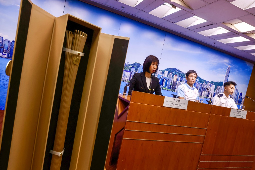 (From left) Chief Transport Officer Marie Sin, National Games Coordination Office Hong Kong head Yeung Tak-keung and Superintendent Aubrey Siu of the police force. Photo: Jonathan Wong