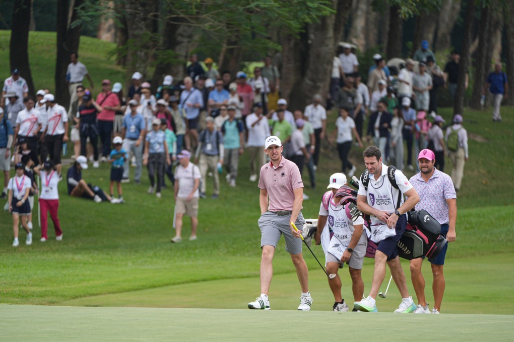 Northern Ireland’s Tom McKibbin walks up to the 18th green on the final day of the Link Hong Kong Open. Photo: Eugene Lee