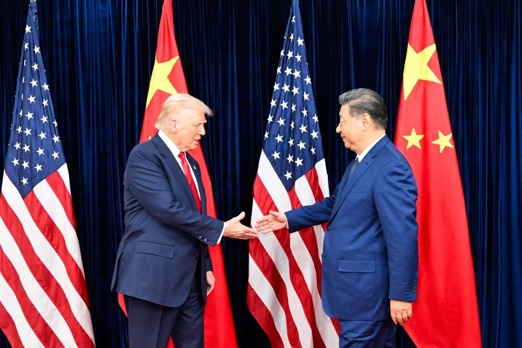 US President Donald Trump (left) greets Chinese President Xi Jinping in South Korea on Thursday. Photo: Xinhua