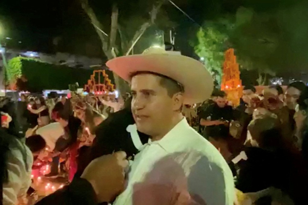 Mayor Carlos Manzo attends a candlelight Day of the Dead festival in Uruapan, Michoacan state, Mexico, just before he was shot dead on Saturday. Photo:  Carlos Manzo via Facebook / Handout via Reuters