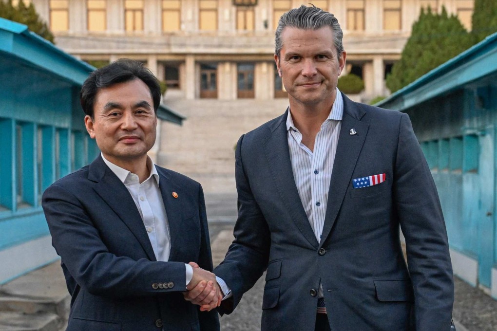 US Defence Secretary Pete Hegseth (right) shaking hands with South Korean Defence Minister Ahn Gyu-back as they visit the truce village of Panmunjom in the demilitarized zone dividing the two Koreas on Monday. Photo: AFP/South Korean Defence Ministry