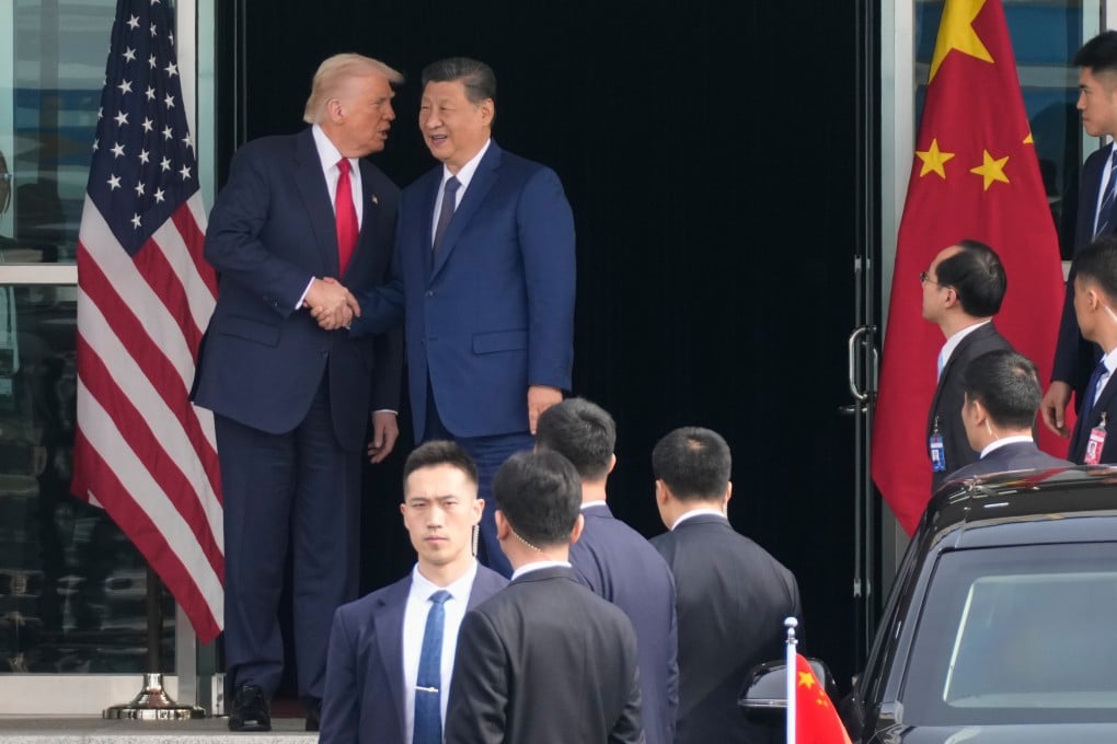 US President Donald Trump and Chinese President Xi Jinping shake hands before their summit at Gimhae International Airport in Busan, South Korea on October 30. Photo: AP