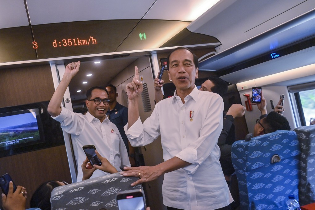 Indonesia’s then president Joko Widodo (centre, right) reacts as a train on the Jakarta-Bandung High-speed Railway reaches 351 km/h during a test ride in 2023. Photo: EPA-EFE