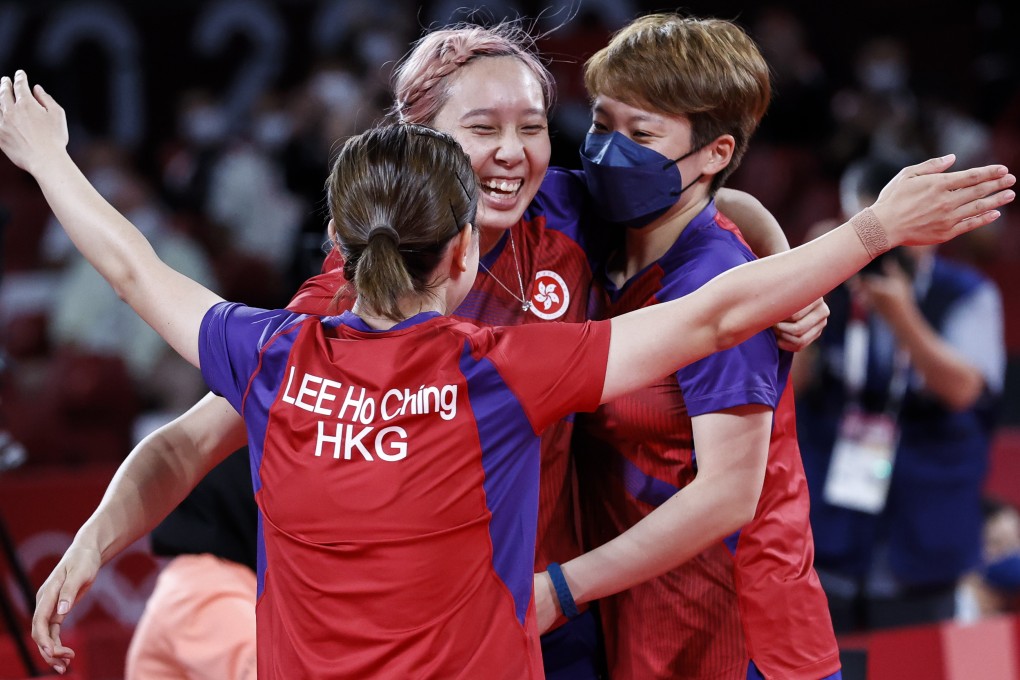 Hong Kong’s (from left) Lee Ho-ching, Minnie Soo Wai and Doo Hoi-kem celebrate winning bronze at the Tokyo Olympics. Photo: EPA-EFE