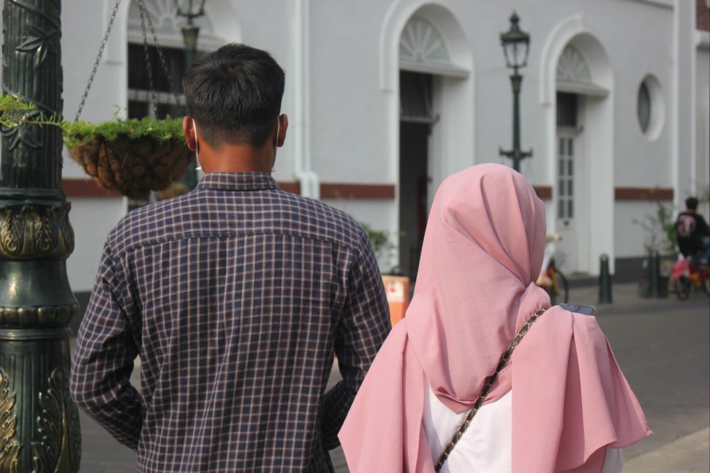 A couple walking in one of the old city areas in Indonesia. Nearly 400,000 couples divorced in the country last year. Photo: Shutterstock
