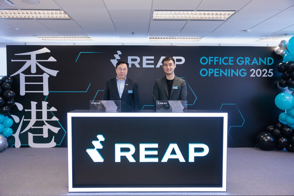 Kevin Kang, co-founder of Reap (right), and Arnold Lau, of InvestHK, attend the opening of the headquarters. Photo: Handout