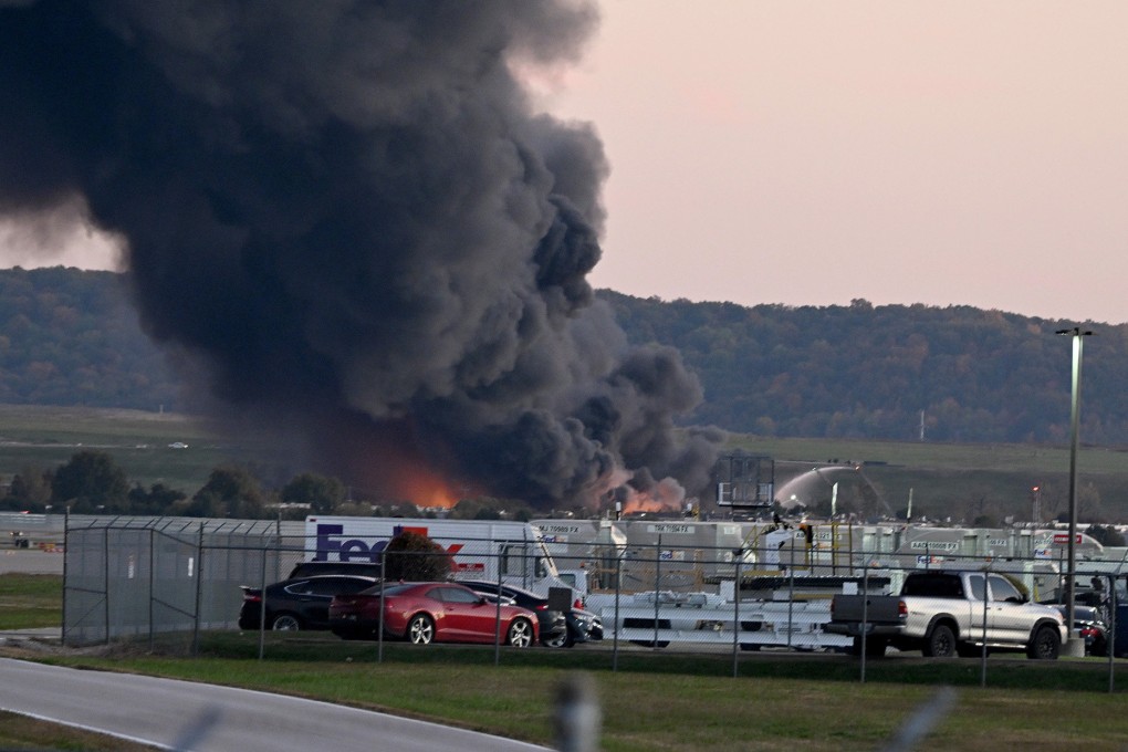 Fire and smoke where a UPS cargo plane crashed near Louisville Muhammad Ali International Airport in Louisville, Kentucky. Photo: AFP
