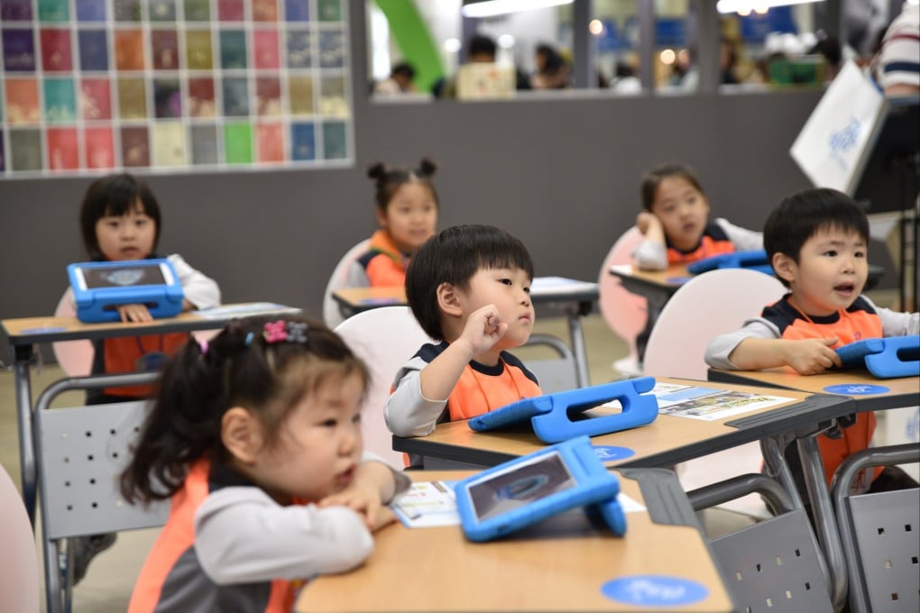 A group of kindergarten students focus on their teacher at the Seoul International Book Fair in 2017. Photo: Shutterstock