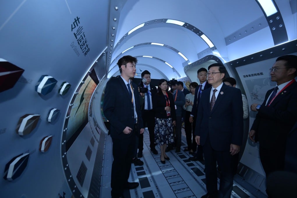 Hong Kong Chief Executive John Lee Ka-chiu touring the 8th China International Import Expo in Shanghai on November 5. Photo: ISD