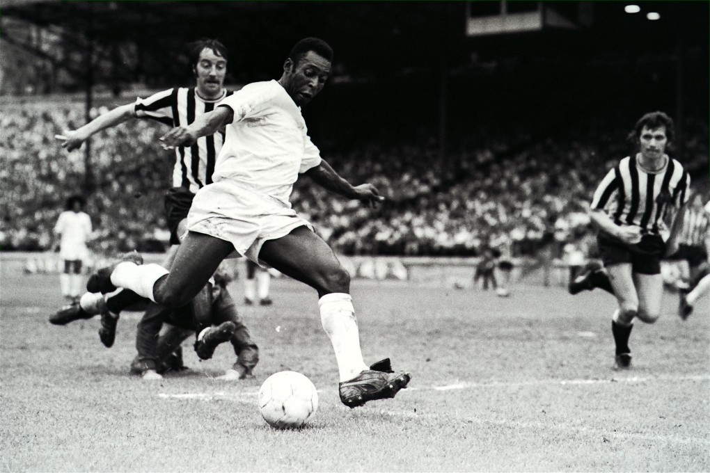 Football legend Pele in action for his team Santos in an exhibition game against British side Newcastle at the Hongkong Stadium in 1972. Photo: SCMP Archives