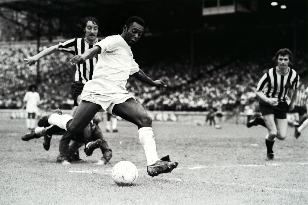 Football legend Pele in action for his team Santos in an exhibition game against British side Newcastle at the Hongkong Stadium in 1972. Photo: SCMP Archives