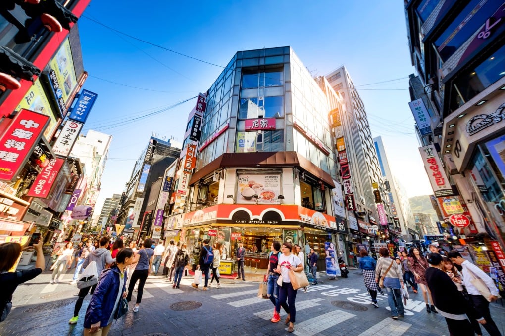 Tourists visit a shopping hub in Seoul, South Korea. Photo: Shutterstock