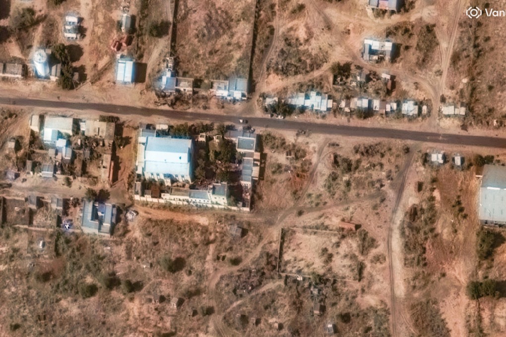 This satellite image shows a trench experts suspect of being a mass grave being dug near a former children’s hospital in El-Fasher, Sudan. Photo:  Vantor via AP