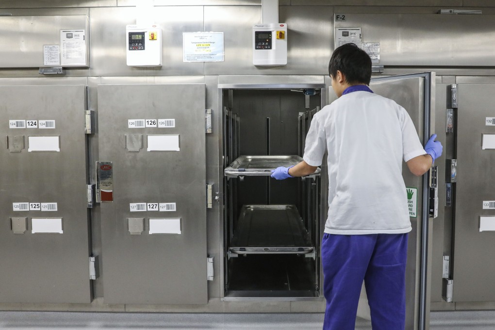 A worker at the mortuary in Queen Mary Hospital in Pok Fu Lam. Photo: K. Y. Cheng