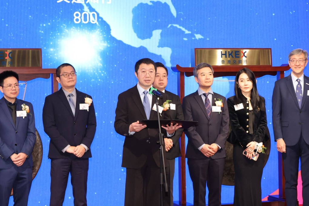 Tony Han, founder and CEO of WeRide (at microphone), speaks at the company’s listing ceremony at the headquarters of bourse operator Hong Kong Exchanges and Clearing in Central on November 6, 2025. Photo: Nora Tam