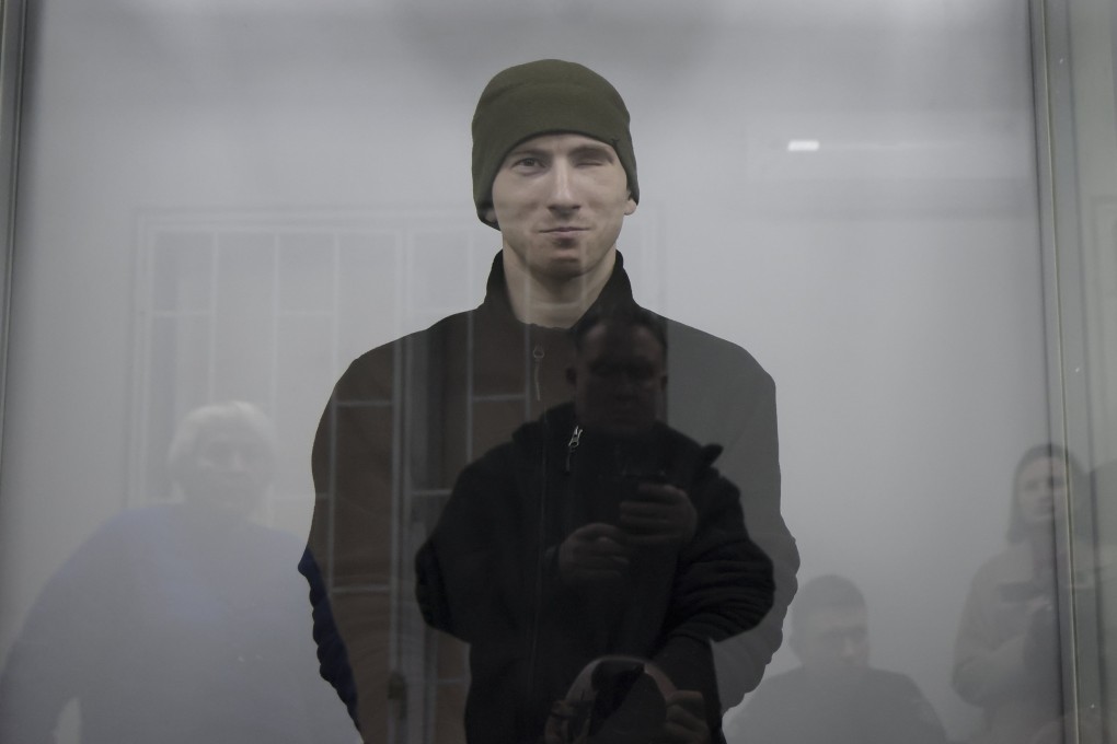 Captured Russian soldier Dmitry Kurashov attends a court hearing in the city of Zaporizhzhia, Ukraine, on Thursday. Photo: EPA