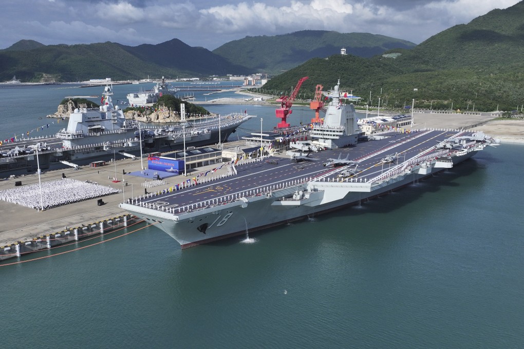 The Fujian, China’s newest aircraft carrier, is commissioned on Wednesday in Sanya, Hainan province. Photo: Xinhua