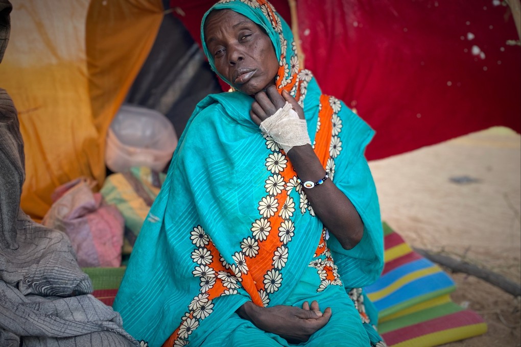 A woman who fled El-Fasher rests at a camp in Tawila, Sudan, in October. Photo: APO