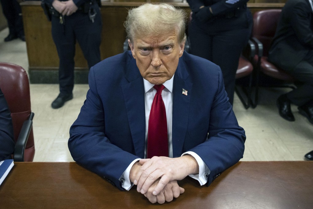Donald Trump waits for the start of proceedings in Manhattan criminal court in New York in April 2024. Photo: AP
