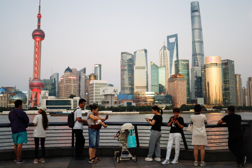 People enjoy themself on the Bund near the financial district of Pudong, in Shanghai, China, on September 27, 2024. Photo: Reuters