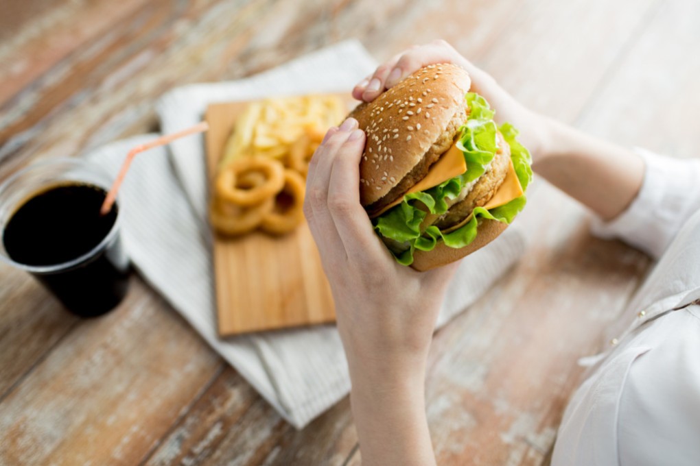 Cheeseburgers are a common go-to for athletes after intense competition. Photo: Shutterstock