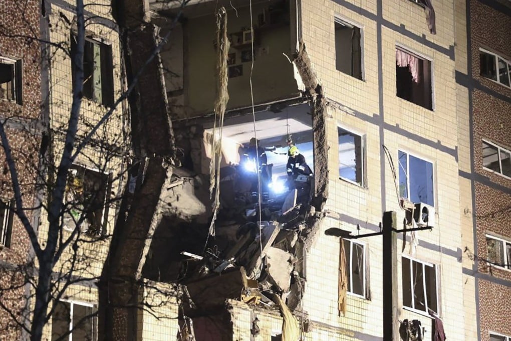 Ukrainian rescuers work at the site of a Russian strike on a residential building in Dnipro on Saturday. Photo: Dnipropetrovsk Regional State Administration/EPA