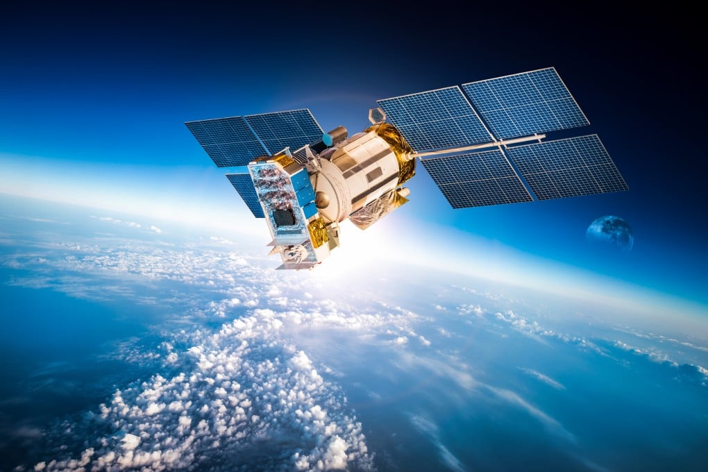 A space satellite orbiting the earth. Photo: Shutterstock