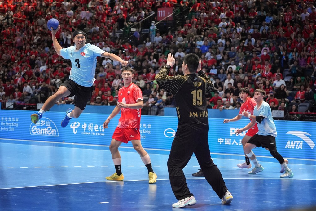 Hong Kong’s Chan Tsz-long (left) scores against Anhui in their semi-final loss on Saturday. Photo: Elson Li