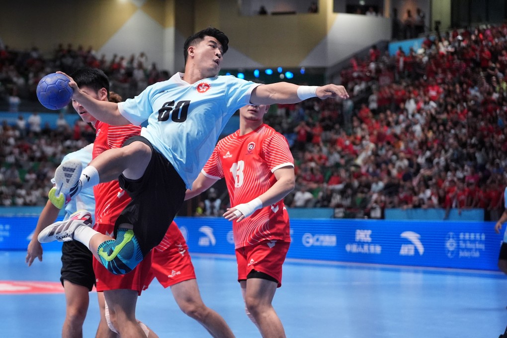 Hong Kong’s Lau Kin-pan on the attack during his team’s handball semi-final against Anhui. Photo: Elson Li