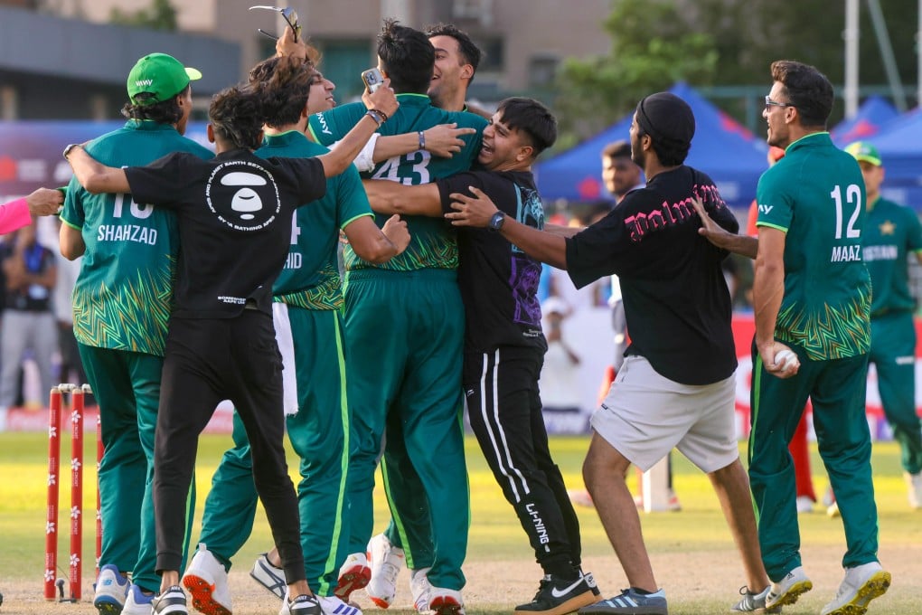 Pakistan celebrate with ecstatic fans after beating Kuwait to win the Hong Kong Cricket Sixes. Photo: Jonathan Wong