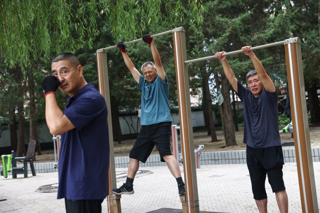 Elderly men exercise in a park in Beijing. China had 300 million people aged 60 and above at the end of 2024. Photo: EPA
