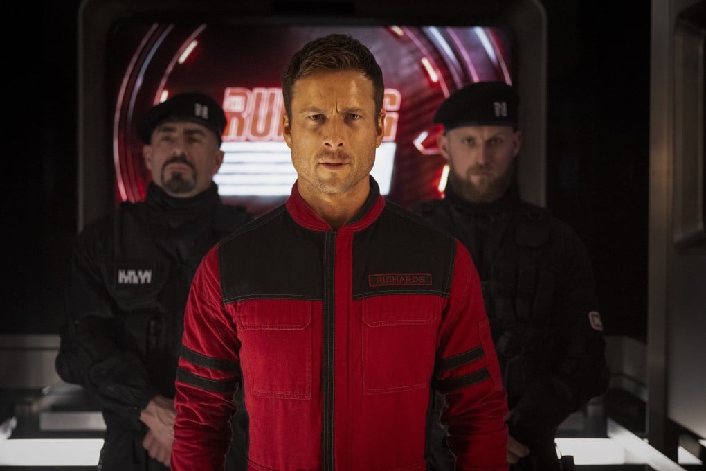 Glen Powell (centre) in a still from The Running Man. Stephen King and Edgar Wright talk about the original novel, the 1987 film and its latest iteration. Photo: Paramount Pictures