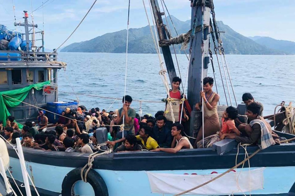 A boat carrying suspected ethnic Rohingya migrants is seen detained in Malaysian territorial waters on April 5, 2020. Photo: Reuters