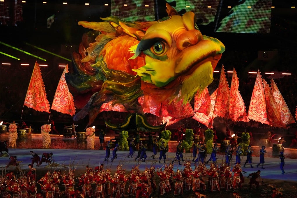The popular fish at the opening ceremony held at Guangdong Olympic Stadium was manipulated by a group of around 20 puppeteers on the ground. Photo: Elson Li