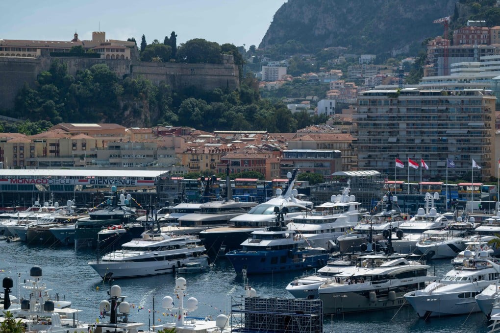 Yachts are seen docked at the Monte Carlo harbour in Monaco, on May 21. Photo: AFP