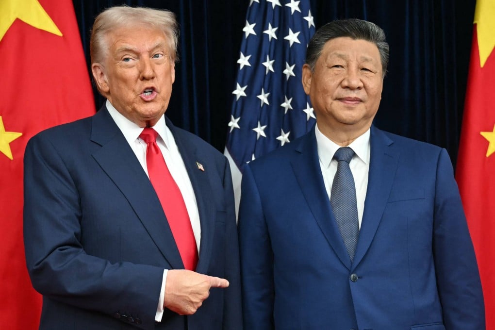 US President Donald Trump (left) and President Xi Jinping greet each other as they arrive for talks at the Gimhae Air Base, located next to the Gimhae International Airport in Busan, South Korea, on October 30. Photo: AFP