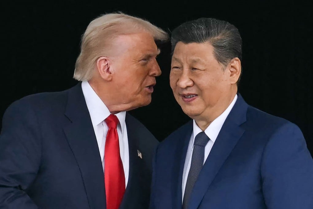 US President Donald Trump (left) talks to China’s President Xi Jinping as they shake hands after their talks at the Gimhae Air Base, in Busan, South Korea, on October 30. Photo: AFP/Getty Images/TNS