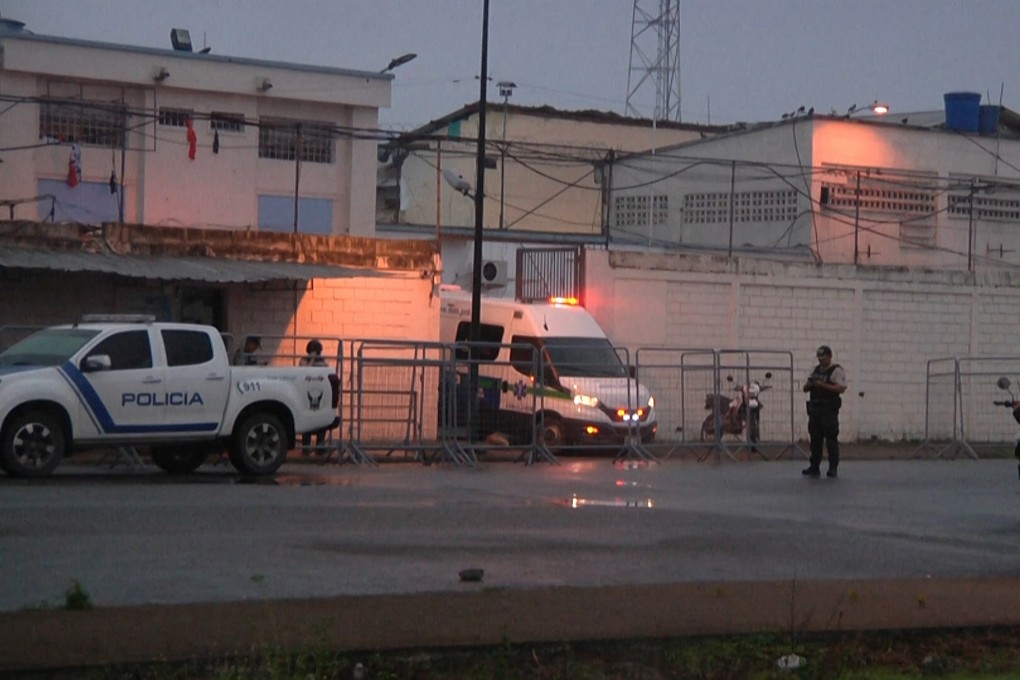 An ambulance at the entrance of the prison in Machala, Ecuador. Photo: AFP