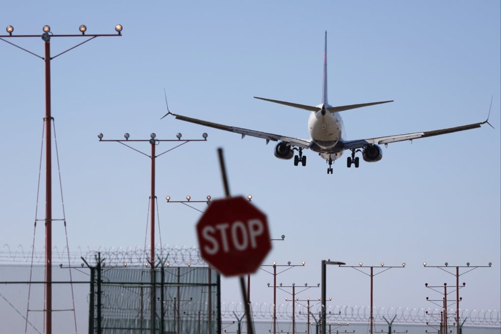 A plane lands at Los Angeles International Airport. Photo: EPA