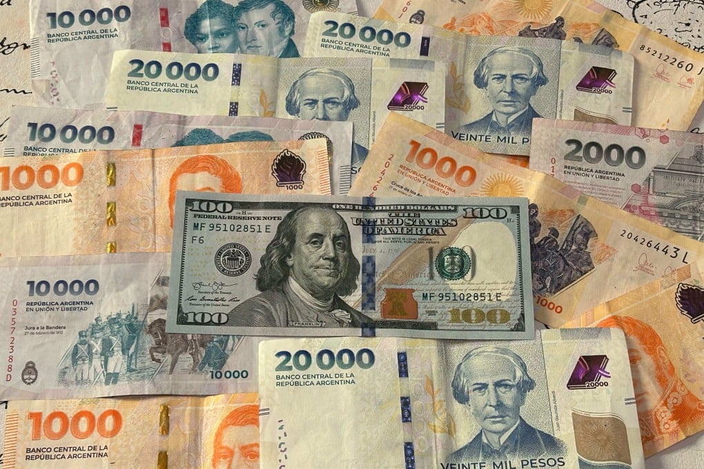 A photo collage of global currencies with the US dollar in the centre. Photo: Agence-France Presse
